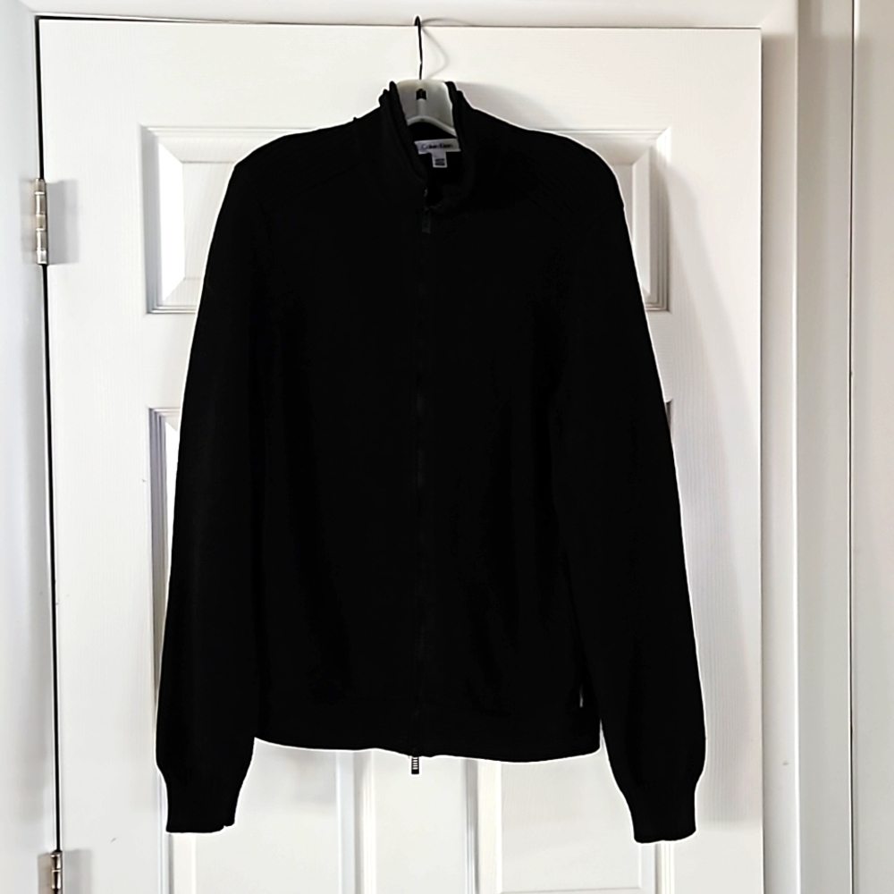 A Calvin Klein rich black full zip sweater.